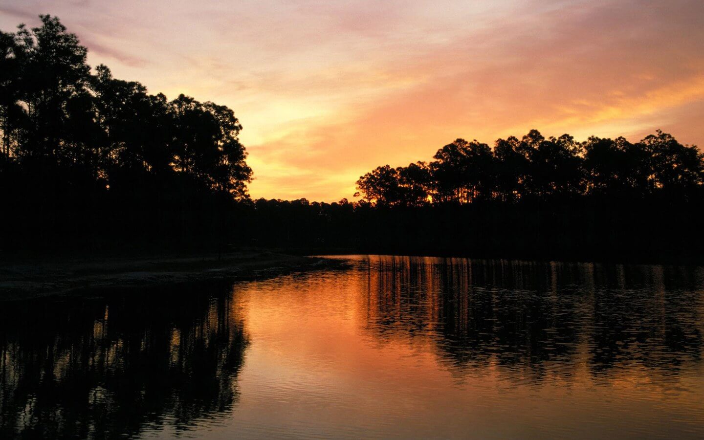 Sunset over Maiden Erlegh lake